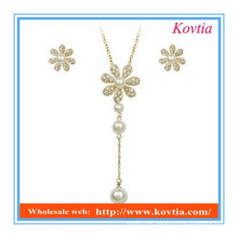 fancy jewelry set 2014 fashion snowflake design long pendant pearl necklace and earrings set